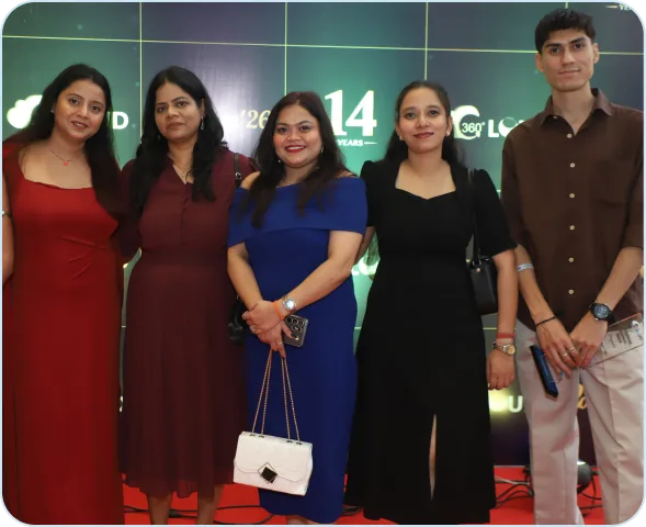 Team members celebrating together at a social event