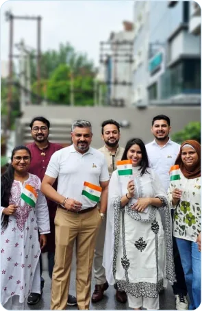 Team members posing together during an office event